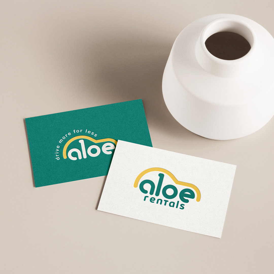 No-Issue-4 Business cards for "aloe rentals" with a yellow car logo, green and white designs. Ideal inspiration for online course website design Australia.
