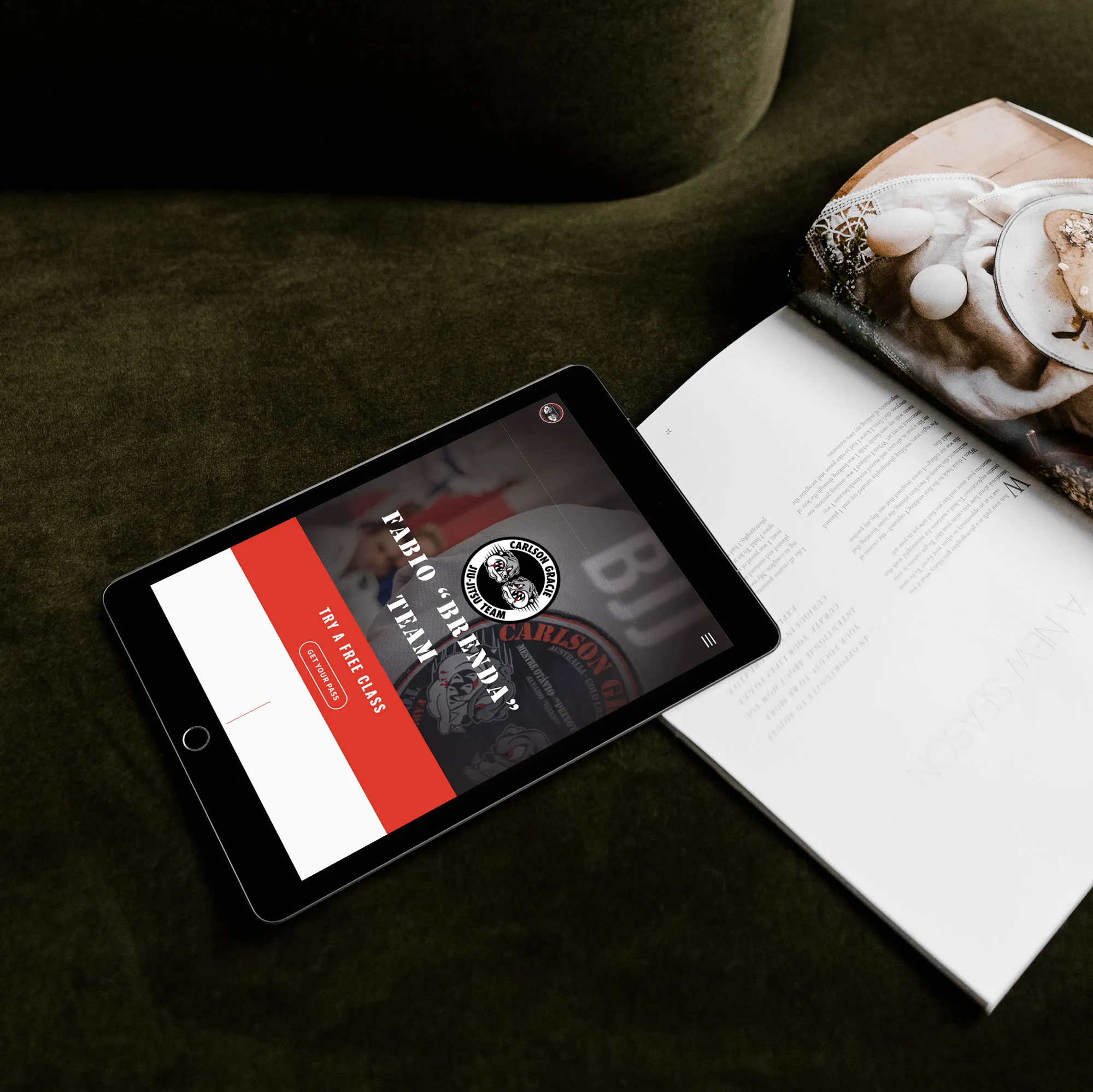 Carlson Gracie Gold Coast WordPress website on tablet showing the BJJ academy's class schedule.