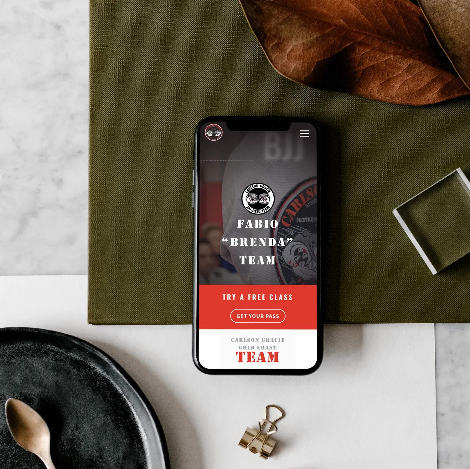 Carlson Gracie Gold Coast WordPress website on mobile with 'Try a Free Class' button.